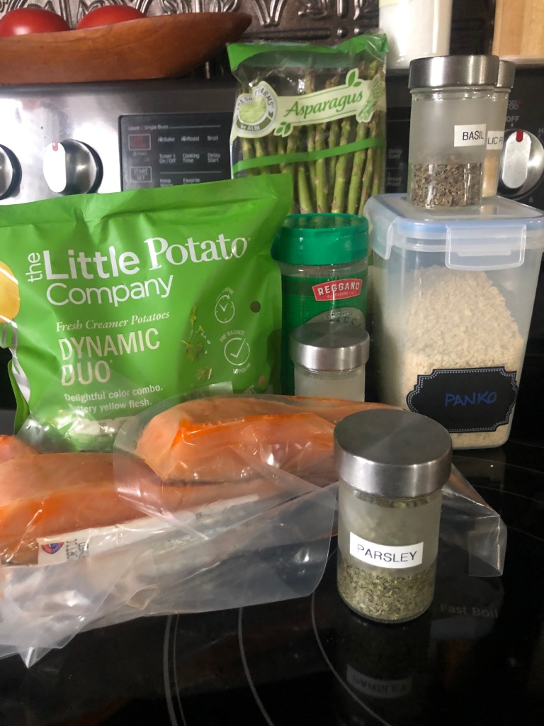 Ingredients for herbalicious salmon, potatoes and asparagus sheet pan dinner.